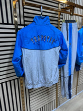 Chandal Trapstar azul y gris